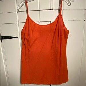 Bright orange spaghetti strap camisole. Size L. No tags. Appears to be cotton.
